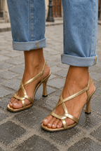ESTÍBALIZ | TACONES DORADOS METÁLICOS CRUZADAS