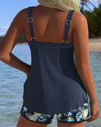 CARLA | TRAJE DE BAÑO DE RAYAS CON SHORT FLORAL